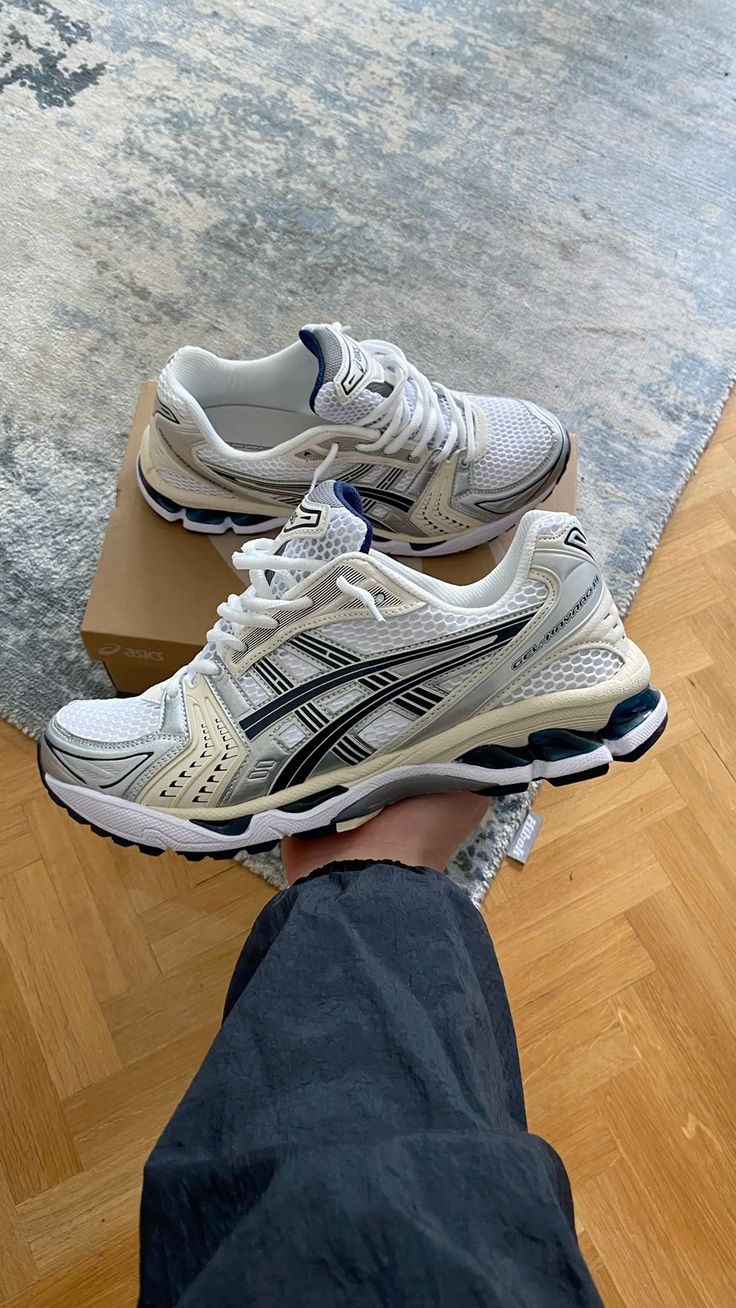 Blue ASICS sneakers from customer Sophie