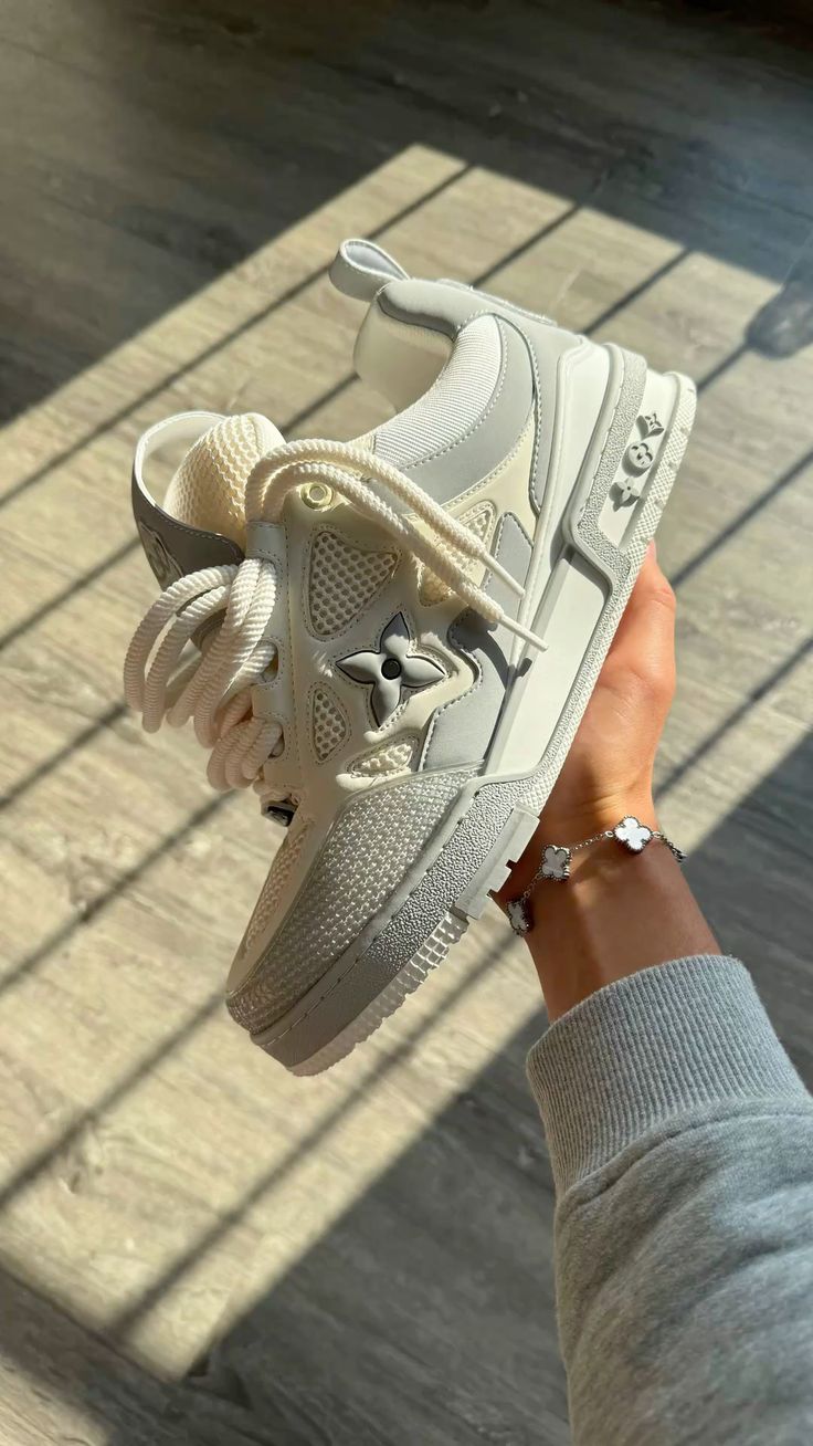 Black and white sneakers on a shoe box